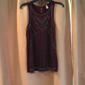 Maroon sparkly sleeveless shirt
